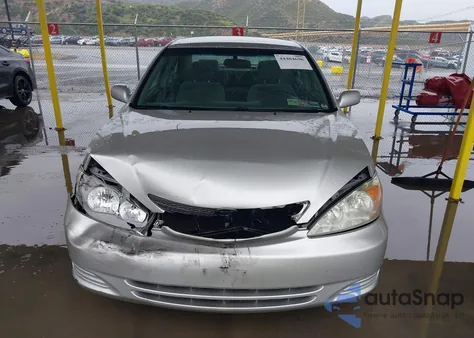 2004 Toyota Camry Le z USA, uszkodzony, nr VIN 4T1BE30K84U371222